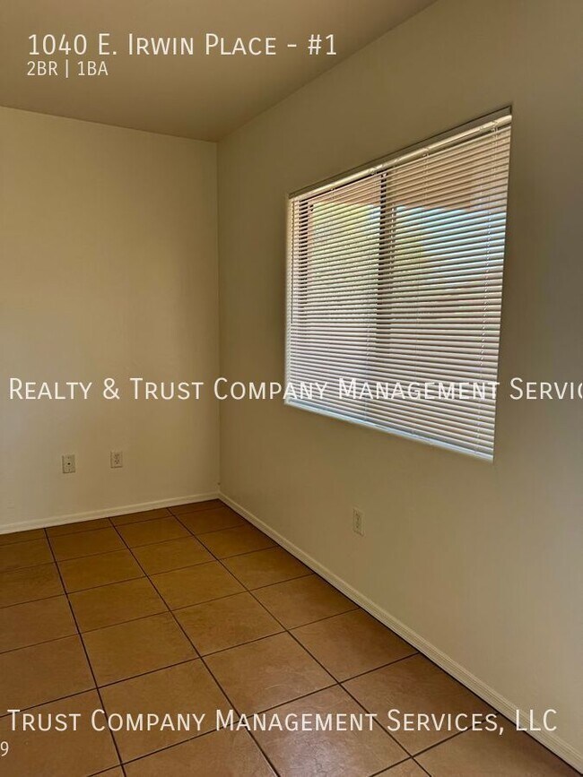 Building Photo - Centrally Located Duplex w/Tile Floors