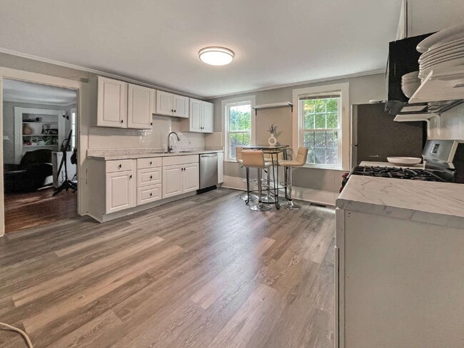 Building Photo - Seeking a roommate for a 2 bdr, 2 bath lower level condo with a porch and private yard, 1.5 miles...