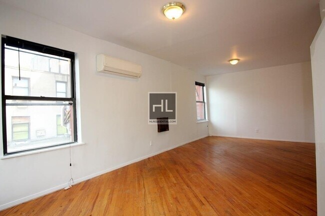 Building Photo - Sunny Studio in Prime East Harlem