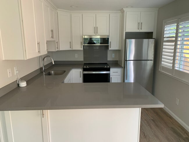 Includes a dishwasher, microwave and full size Fridge - 2500 Gerald Way