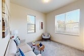Located at 805 W Spruce St in Missoula, Montana, this one-bedroom, one-bathroom unit offers a thoughtfully arranged single-floor layout that maximizes every square foot. The galley-style kitchen runs along one wall, featuring light maple cabinetry, dark countertops, a double sink, and white appliances including a range, dishwasher, and refrigerator. A pantry provides additional storage, and the adjoining hallway leads to multiple closets, keeping the space well-organized.

The combined living and dining area is bright and welcoming, with large windows on two walls that fill the room with natural light and offer views of the surrounding neighborhood's mature trees. Neutral carpet and warm wall tones create a calm, comfortable ambiance throughout.

The bedroom is carpeted and fitted with mirrored sliding closet doors that reflect light and enhance the sense of space. A window overlooks the outdoors, maintaining a connection to the natural surroundings. The bathroom includes a wood-toned vanity with a dark countertop, ample under-counter storage, and a shower-tub combination. An in-unit laundry area adds everyday convenience to this compact and efficiently designed Missoula residence.