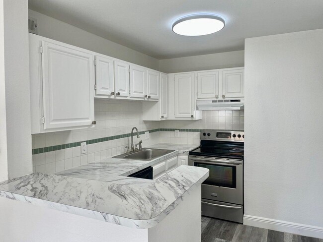 Building Photo - 1760 Palm Cove Blvd