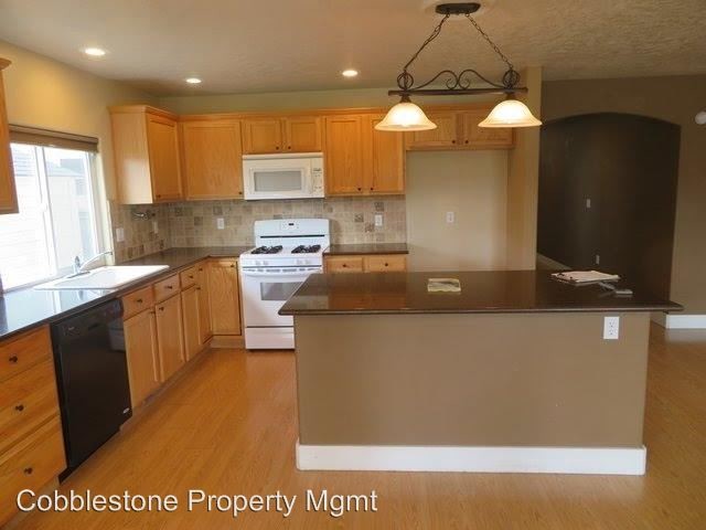 Building Photo - 4 br, 2.5 bath House - 203 E. Cornell Dr.