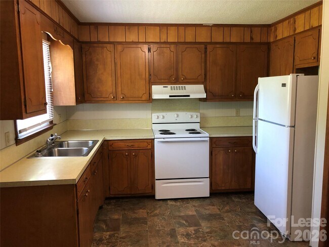 Foto del edificio - 1411 Roundtree Ln