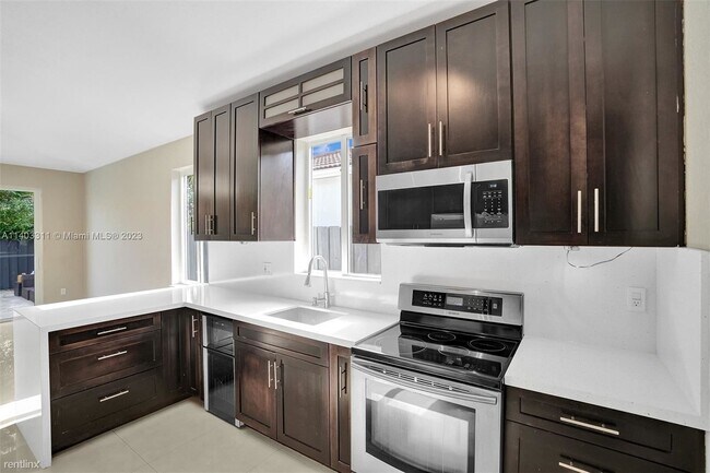 Building Photo - 4 br, 2 bath House - 8843 NW 167th St