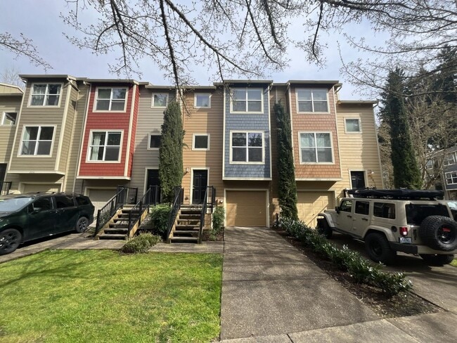 Building Photo - Beautiful 2 Bedroom Townhome with Walk-In Closets Private Deck & Attached Garage