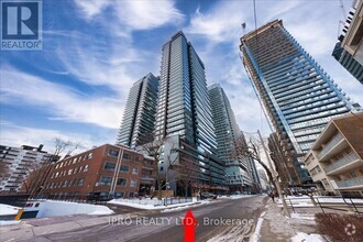 Building Photo - 117-1117 Broadway Ave