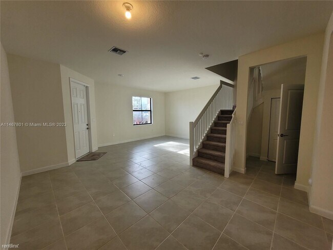 Building Photo - 3 br, 2.5 bath House - 11446 W 33rd Way