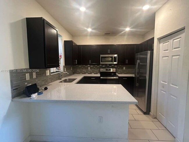 Building Photo - 6501 N Anise Ct