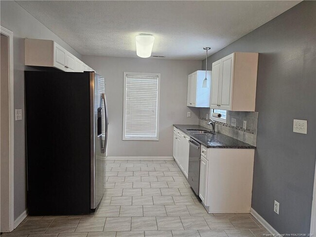 Foto del edificio - 5708 Spreading Branch Rd