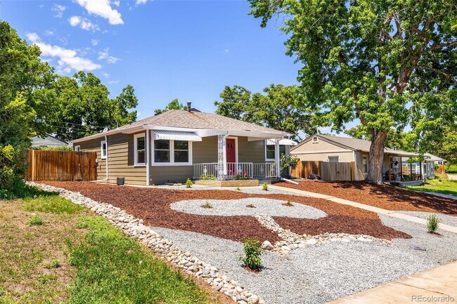 Building Photo - "Charming 3-Bedroom Denver Home with Hardwood Elegance on South Osage Street!"