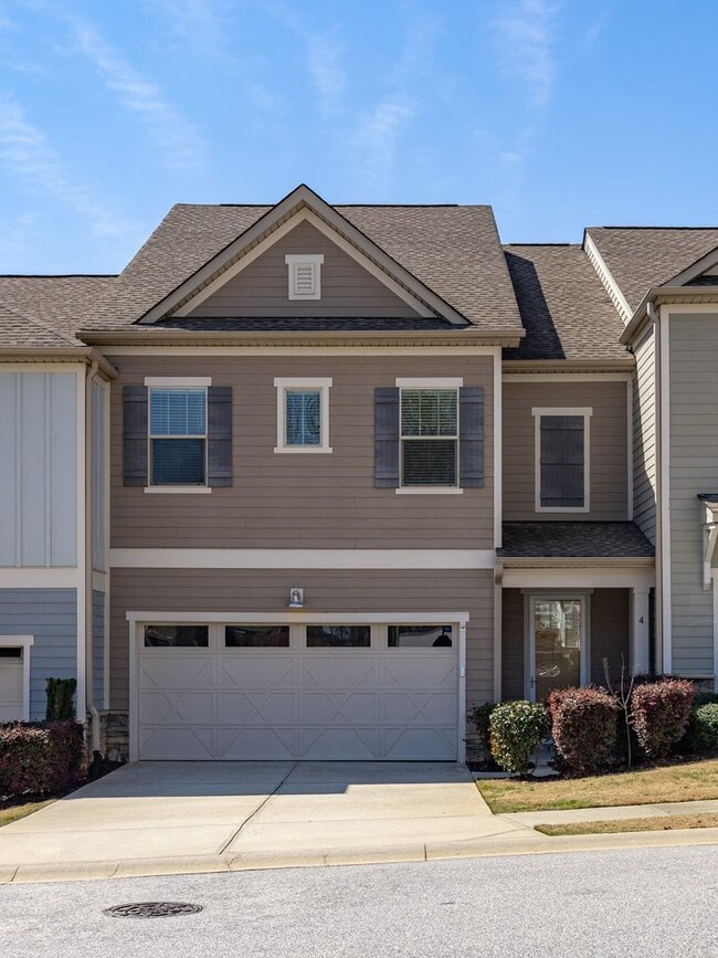 Building Photo - **MOVE IN SPECIAL! 50% off first month's rent!!** Spacious 4BR Townhouse with 2-Car Garage Near D...