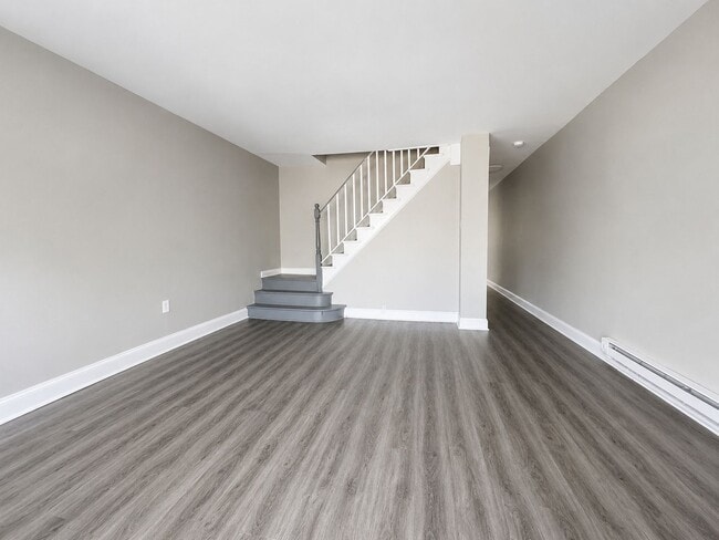 Photo - Spacious 3-Bedroom Rental with Front Porch, Backyard & Basement House