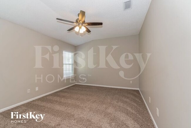 Foto del edificio - 7444 Lake Plantation Ln
