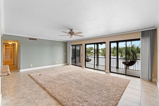 Building Photo - Lakefront lifestyle in this stunning 3-bed...