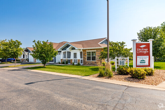 Building Photo - Heritage Cottages 55+ income restricted