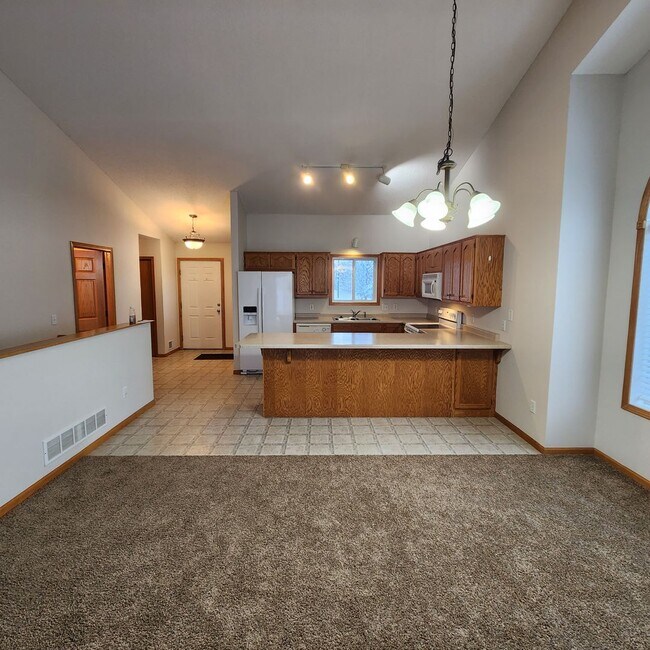 Building Photo - End Unit Walk-Out Rambler Style Town Home ...