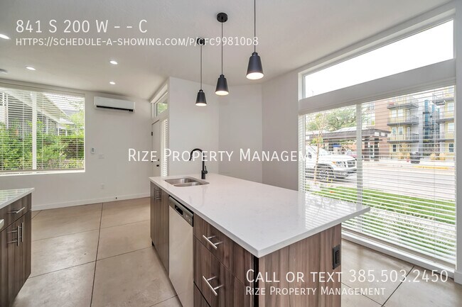 Building Photo - Townhomes Tailored to Your Highest Standards.