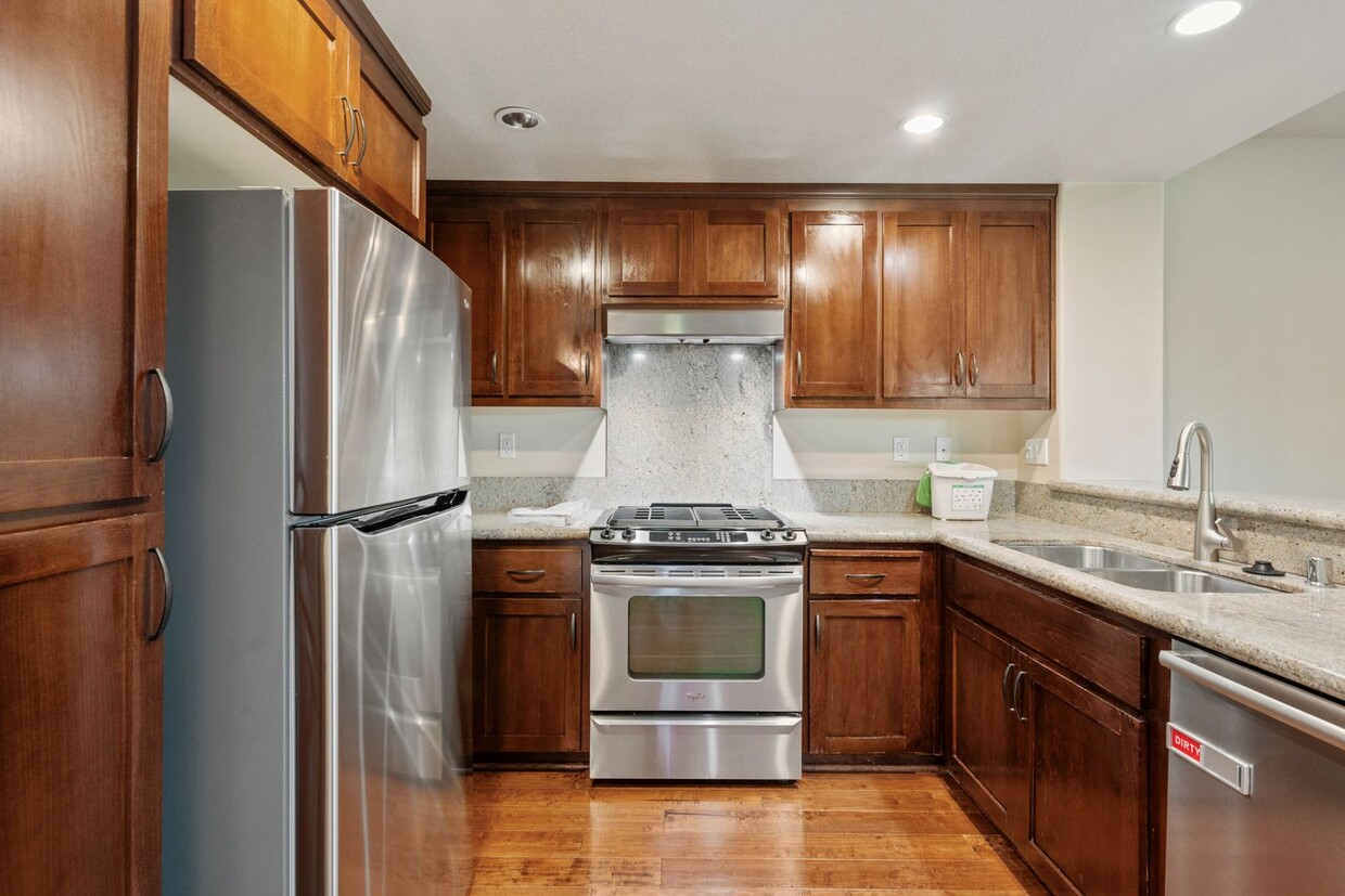 Primary Photo - Spacious and Bright Tri-Level Townhome @ C...