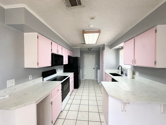 Foto del edificio - 5104 Belaire Dr