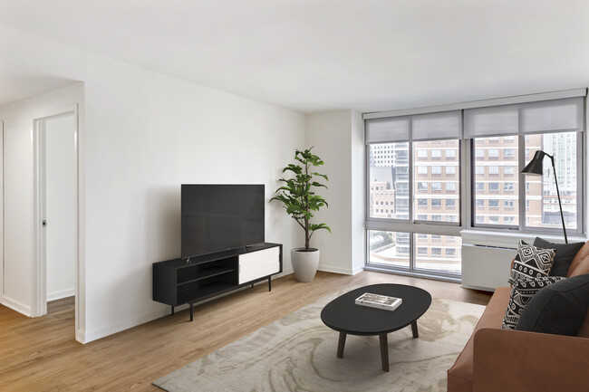 Updated Finishes living room with hard surface flooring - AVA Fort Greene