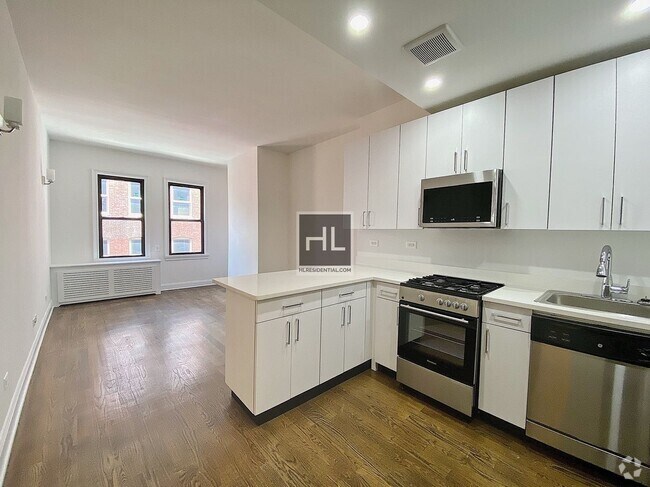 Building Photo - STUNNING West 22 Street Studio !!