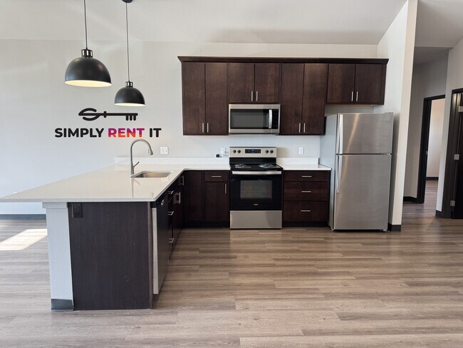 Foto del edificio - New 3 Bedroom, 3 Bathroom Sublease Brick Towne Ames Townhome