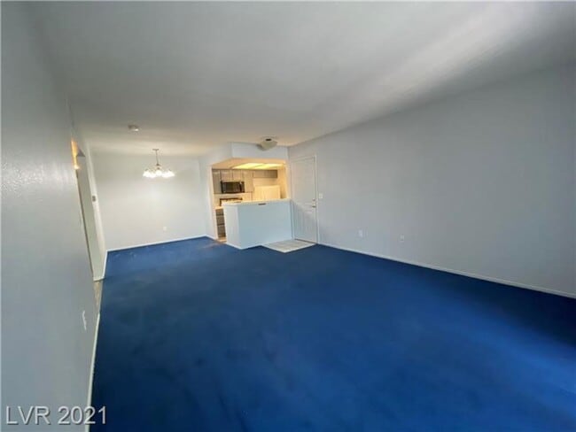 Building Photo - Cozy 1-Bed Condo in Gated 89128 Community ...