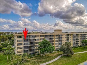 Building Photo - 2751 N Palm Aire Dr