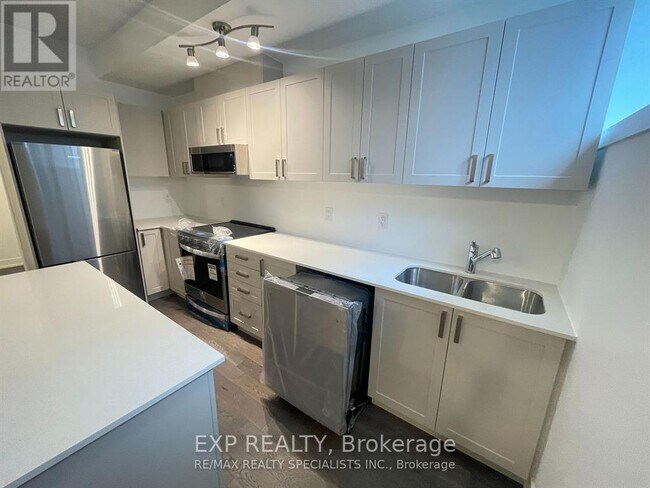 Building Photo - 1075 Douglas McCurdy Cmn