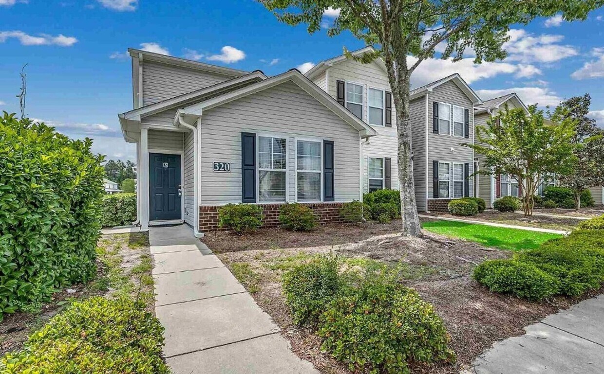 Foto principal - Relax and Unwind in this Spacious End-Unit...
