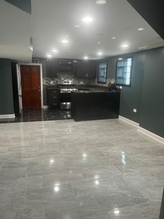 Foto del edificio - 6164 N Hamilton Ave