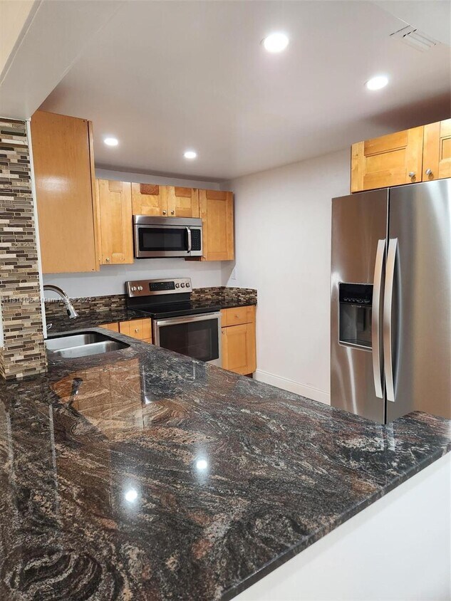 Foto principal - 4384 NW 9th Ave
