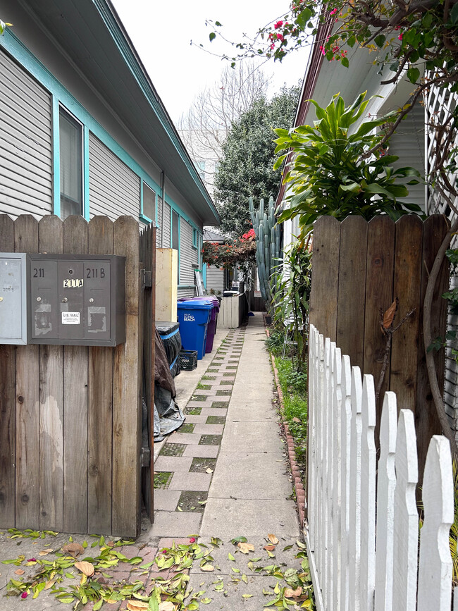 Gate into property (kept closed) and path to Units A & B. - 211 Linden Avenue