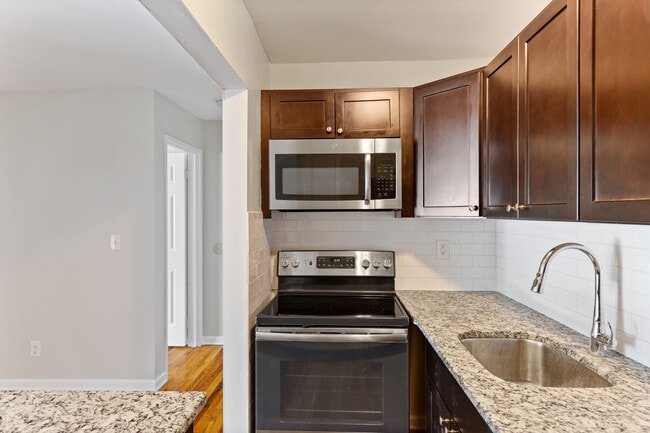 Building Photo - M.C Highland Apartments