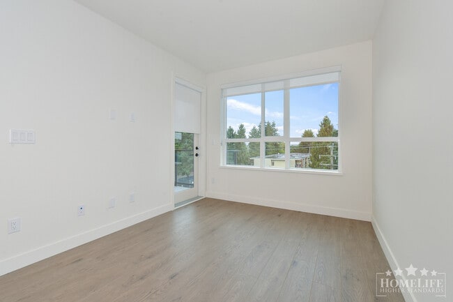 Building Photo - Contemporary 1-Bed Condo at Pura by Adera in Surrey City Centre