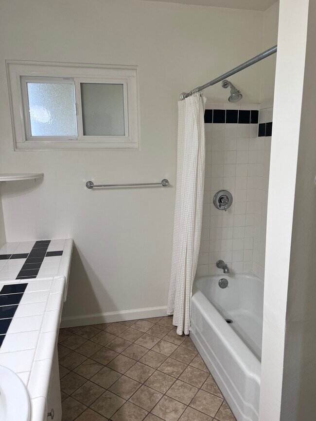 Hall Bathroom with Tub - 8400 Gulana Ave