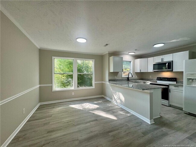 Foto del edificio - 6764 Willowbrook Dr