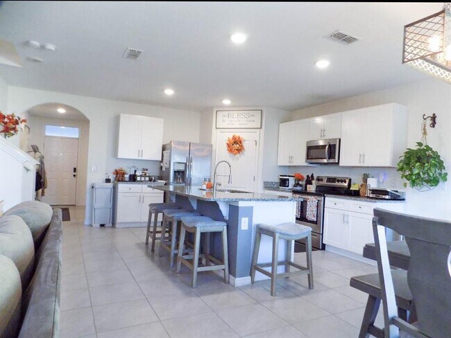 Foto del edificio - 5122 Fiddlewood Way