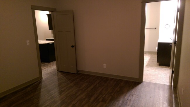 Main level master bedroom. - 3810 Marigold Drive
