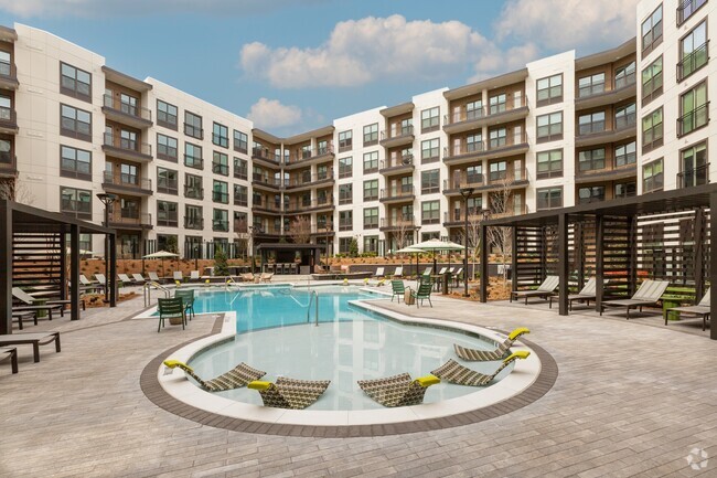 Resort-style Swimming Pool with Tanning Ledge - Bexley Chamblee