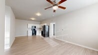This contemporary 810 square foot apartment in Bettendorf, Iowa offers a blend of comfort and style. The open-concept layout maximizes the living space, featuring a combined kitchen and living area. The kitchen boasts sleek white cabinetry, stainless steel appliances, and light-colored countertops, creating a bright and modern cooking environment. 

The apartment includes two bedrooms, with the primary bedroom measuring 130 square feet. Both bedrooms are carpeted for comfort and feature large windows that allow ample natural light. The two bathrooms are well-appointed with modern fixtures, including a shower/tub combination and ample storage space.

Throughout the apartment, neutral tones dominate, with light-colored walls and wood-look flooring in the main living areas. This creates a cohesive and airy feel throughout the space. The use of white trim and doors adds to the clean, contemporary aesthetic.

Energy efficiency and comfort are considered with the inclusion of ceiling fans and modern HVAC controls. The apartment's single-floor layout ensures easy accessibility and convenient living. Located in a desirable area of Bettendorf, this apartment combines modern amenities with a prime location, making it an attractive option for those seeking a contemporary living space.