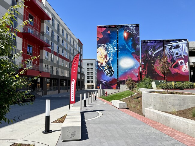 Mural with sign.jpg - Paperbox Lofts