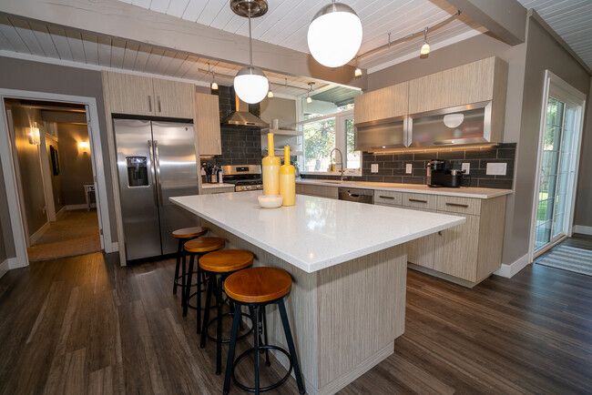 Quartz Countertops with Island Seating - 1240 Burlington Ave