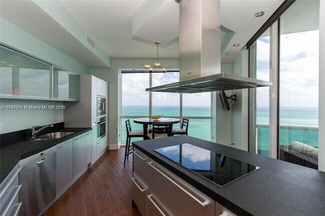 Building Photo - 18201 Collins Ave