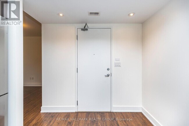 Building Photo - 100 Champagne Ave S