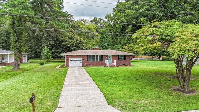 Building Photo - All Brand New Features in this 3 Bedroom 2...