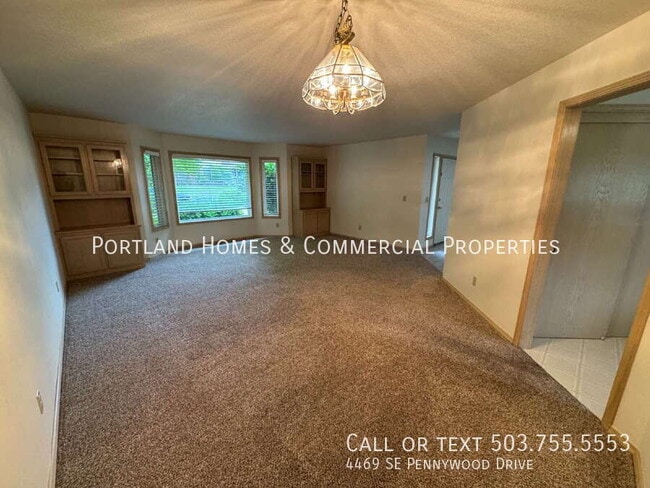 Building Photo - 4469 SE Pennywood Dr