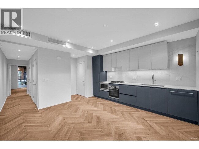 Building Photo - 775 W 49th Ave