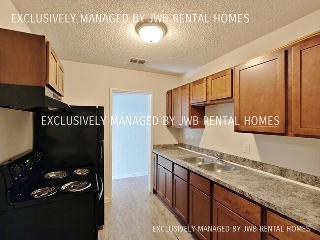 Building Photo - 7823 Paul Jones Dr